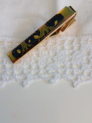 Tie Pin like new, gold and black design