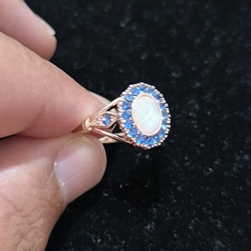 Rose Gold women's ring with white opal and blue crystals, stainless steel