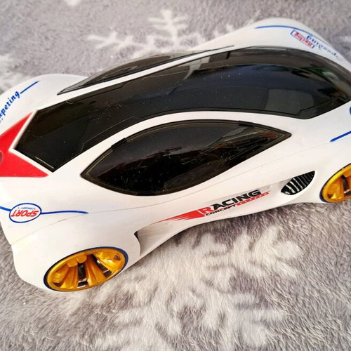 Racing car new with motion, music and lights