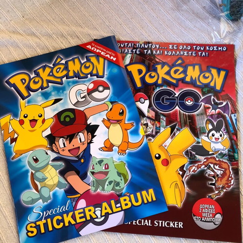 Pokémon 2016 Golden Shop and Giannakis Albums new, set of 2