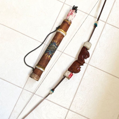 Decorative ethnic bow set with quiver and arrows used