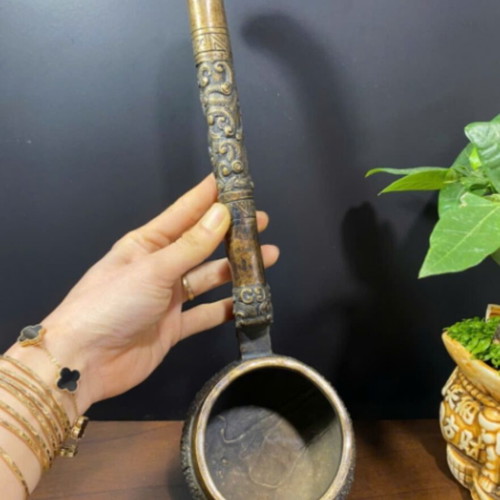 Antique Vietnamese bronze vessel used with dragon and floral design