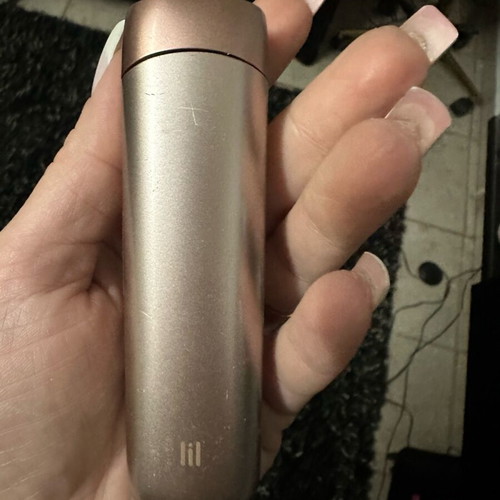 Solid IQOS device used with wear