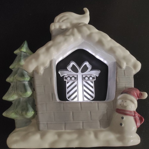 Christmas house with lighted gift, new