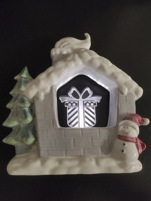 Christmas house with lighted gift, new