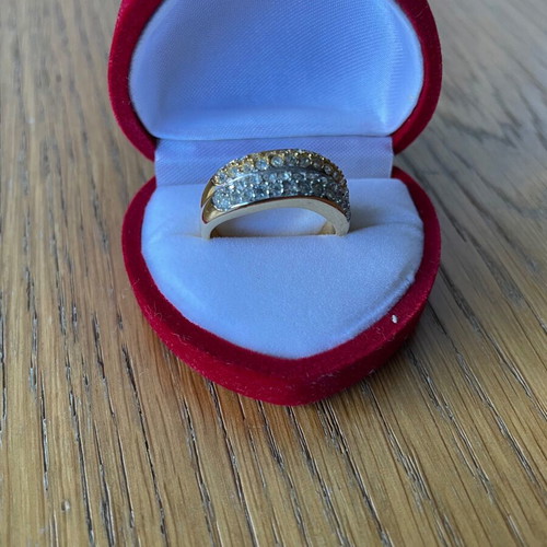 Ring new with two colors gold and silver with zircon unused