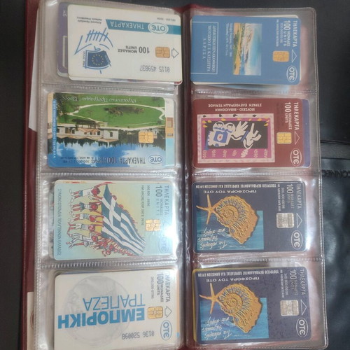 Phone cards used, album with 66 pieces