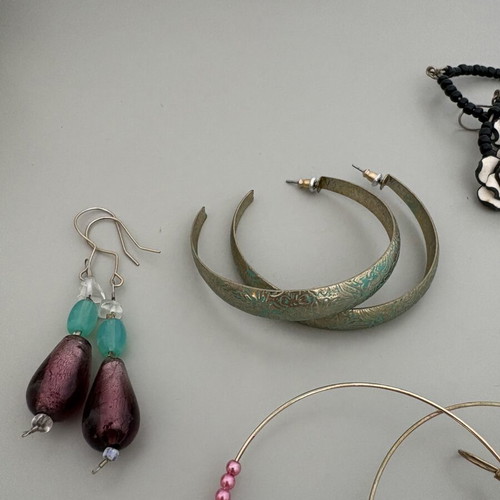 Dangling earrings used, assorted styles