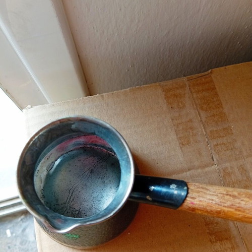 Decorative briki with wooden handle