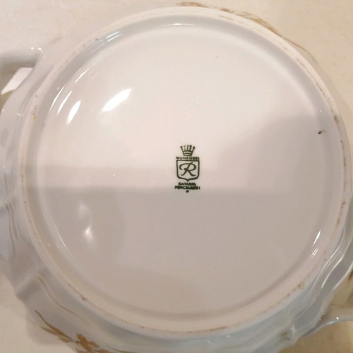 Porcelain soup tureen used with gold floral details