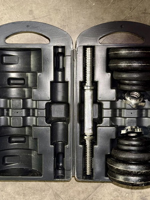 Gym dumbbell set with case used