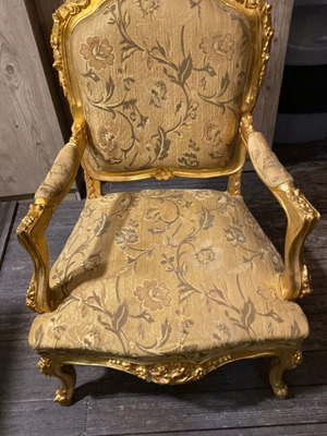 Baroque armchair used with wooden frame and fabric upholstery
