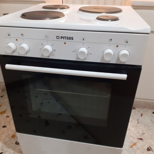 Pitsos PHCB123K29 electric stove like new with trays