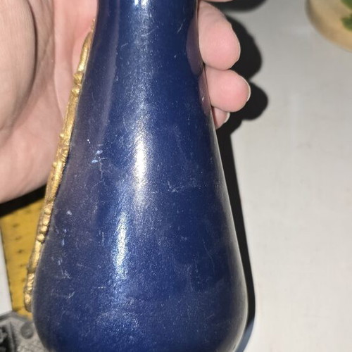 Ceramic vase used with floral decoration
