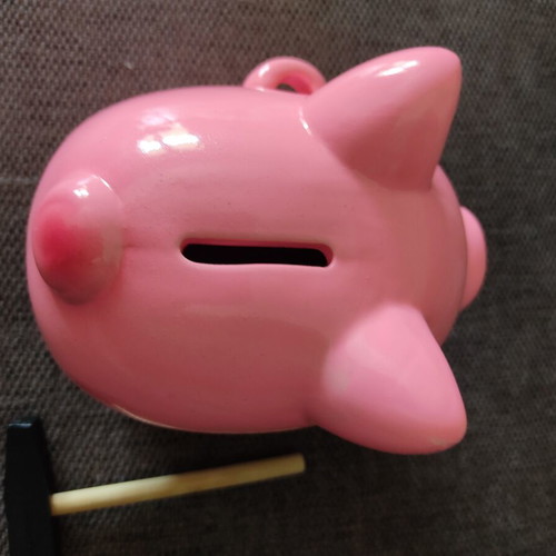 Ceramic piggy bank with hammer like new