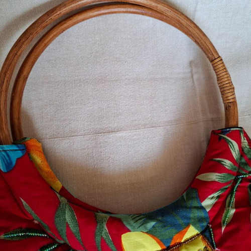 Handbag like new with wooden handle and colorful floral design
