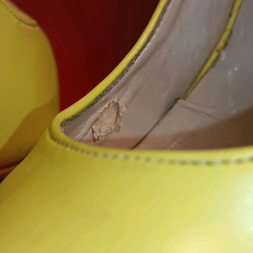 Yellow pumps used, size 37 with minor wear