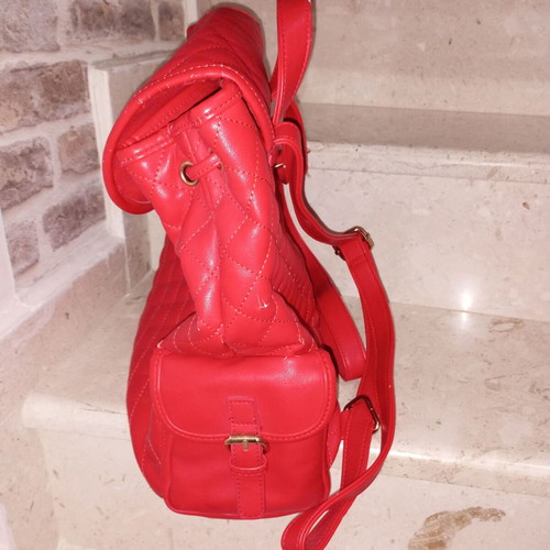 Women's backpack used red with side pockets