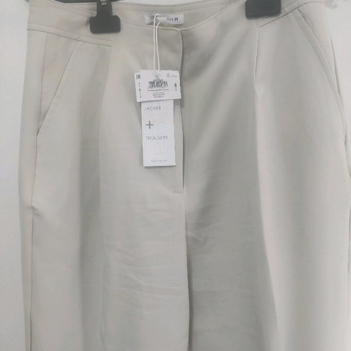Ecru office pants medium new with box