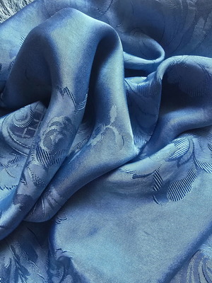 Vintage blue satin bedspread with fringes, used