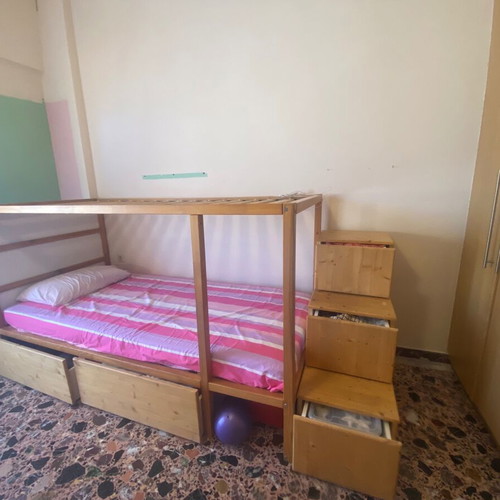 Kura bed used with convertible bunk and storage drawers