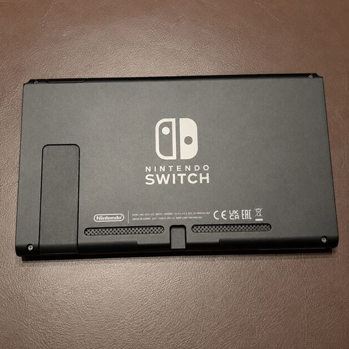 Nintendo Switch V2 console with 128GB SD card and charger