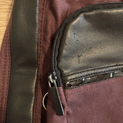 Sisley backpack used, burgundy with zipper pocket