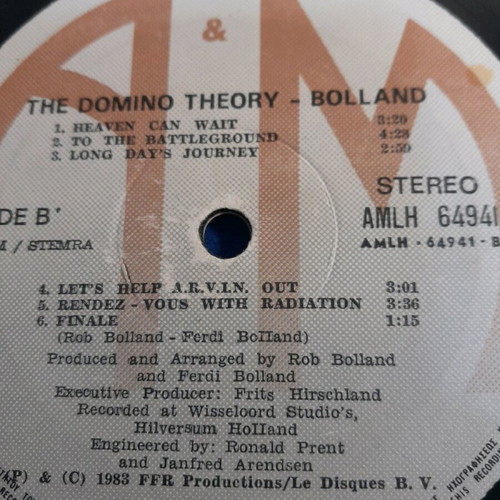 The Domino Theory Bolland vinyl used in good condition