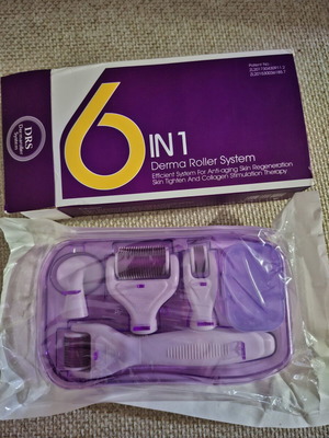 DRS 6 in 1 Derma Roller System microneedling set, new sealed