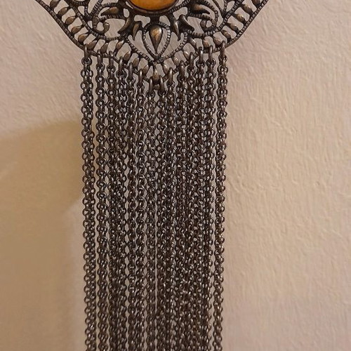 Necklace used, metal pendant