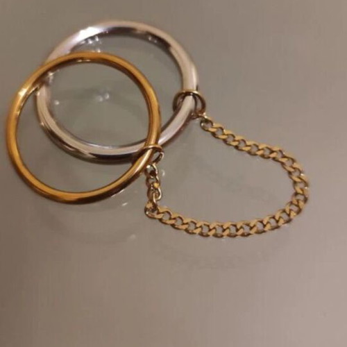 Two-tone ring new with two linked stainless steel bands