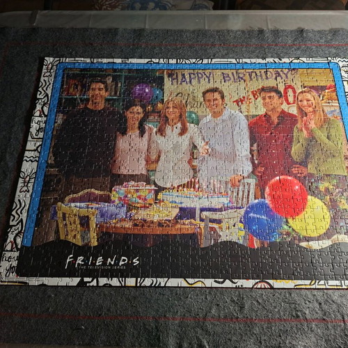 Puzzle Friends 1000 pieces like new with large collectible poster