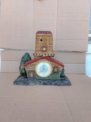 Table clock used, house design 22cm x 22cm, analog