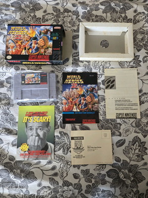 Snes World Heroes 2 like new, complete set