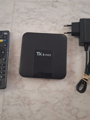 Tanix TX3 Mini Android TV Box used with remote and HDMI cable