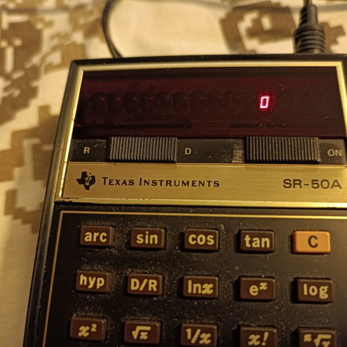 Texas Intsruments SR-50A calculator used with charger and leather case