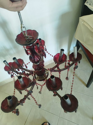 Red chandelier with crystals used, classic ceiling light