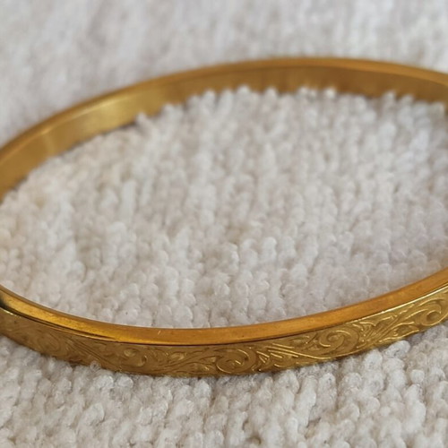 Gold-plated steel bracelet like new, openable