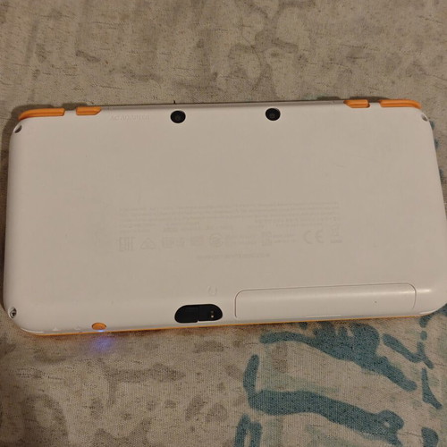 Nintendo 2DS XL with Mario Kart 7, charger and stylus