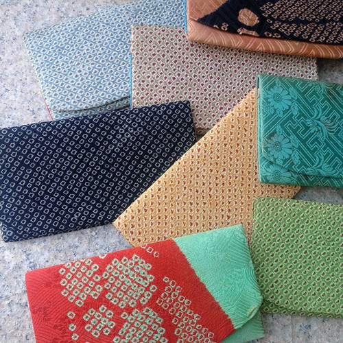 Fabric wallet cases used, all together