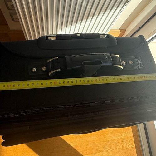 Delsey Black Medium Suitcase used with wheels