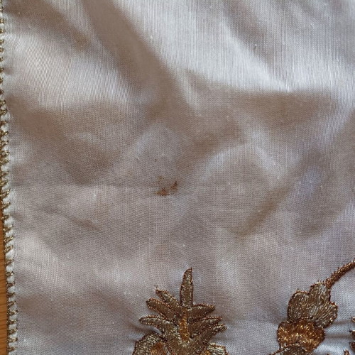 Embroidered table runner used with gold thread and lace