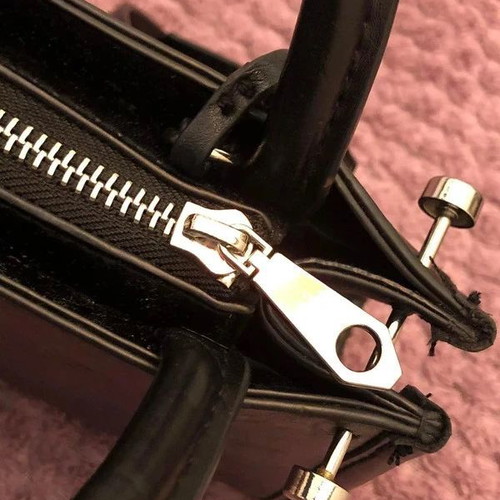 H&M mini black leather handbag new with rock details