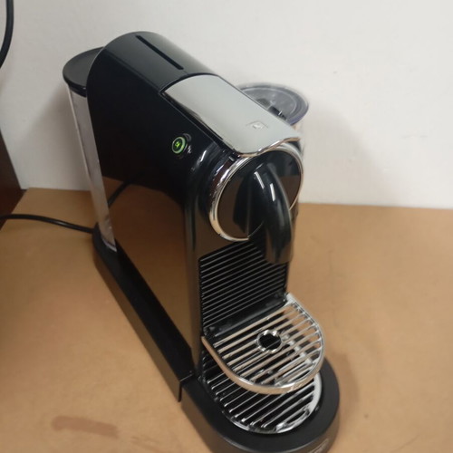 Delonghi Nespresso coffee machine with milk frother