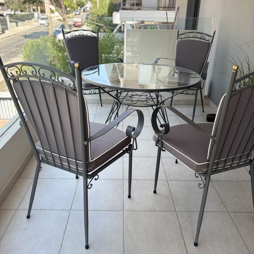 Outdoor dining set used, iron with cushions