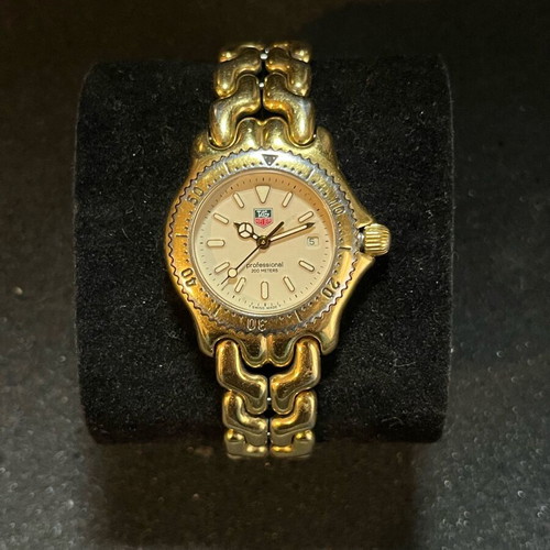 TAG Heuer watches used, gold and silver colors