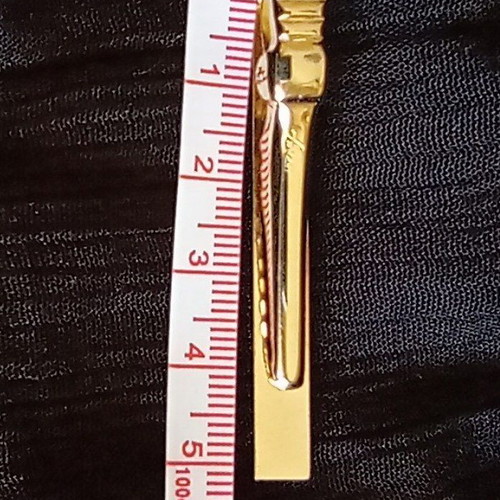 Vintage gold tie clip with embossed floral decoration, like new
