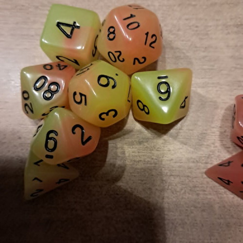 5 sets of glow in the dark D&D dice