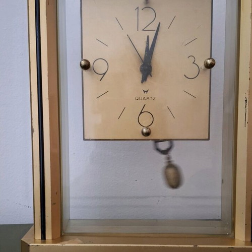 Vintage quartz table clock with pendulum used