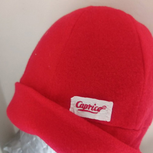 Red knitted Caprice hat slightly used